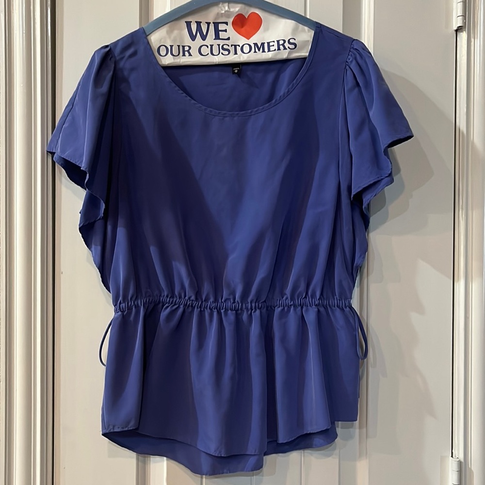 Blue blouse.